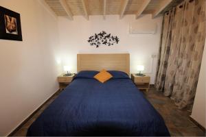 Katil atau katil-katil dalam bilik di The Fruit Suites Limassol