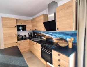 Kuchyň nebo kuchyňský kout v ubytování Ferienhaus Deich Frans