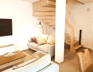 Posezení v ubytování Ferienhaus Deich Frans