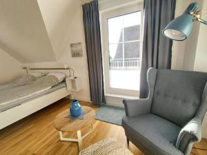 Postel nebo postele na pokoji v ubytování Ferienhaus Deich Frans