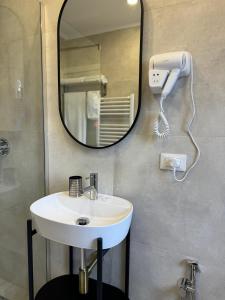 Koupelna v ubytování L’Hotel Tirana