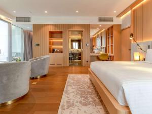 Postel nebo postele na pokoji v ubytování Rixos Premium Qetaifan Island North + 37 fotografií
