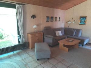 Posezení v ubytování Ferienhaus Robinson Romantikpfad 164