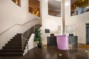 Televisyen dan/atau pusat hiburan di Vienna House by Wyndham Martinspark Dornbirn