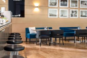 Khu vực ghế ngồi tại Vienna House by Wyndham Martinspark Dornbirn