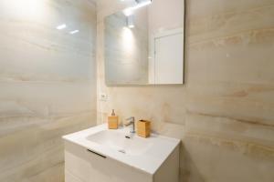 Koupelna v ubytování Palmanova Suites
