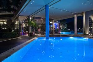 Der Swimmingpool an oder in der Nähe von Dionysos Hotel