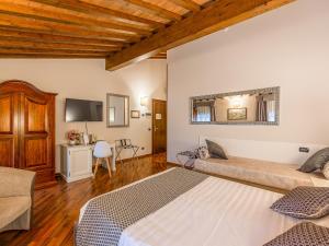 Postel nebo postele na pokoji v ubytování Hotel Villa Cariola