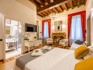 TV a/nebo společenská místnost v ubytování Hotel Villa Cariola