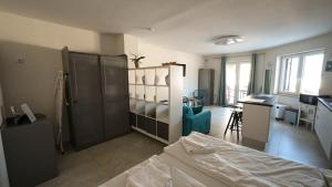 Postel nebo postele na pokoji v ubytování Casa Mira Apartments