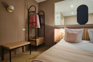 Postel nebo postele na pokoji v ubytování Hotel Halbert