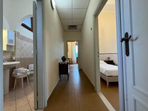 Rúm í herbergi á Monastero SS. Annunziata