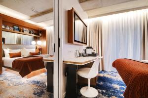 Posteľ alebo postele v izbe v ubytovaní CARD Hôtel