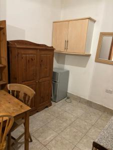 Virtuvė arba virtuvėlė apgyvendinimo įstaigoje Stay in Islington/Arsenal