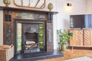 Et tv og/eller underholdning på Abbey View Cottage