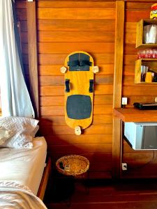 Ένα ή περισσότερα κρεβάτια σε δωμάτιο στο Chalé Flor da Lua - Atins