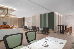 Posezení v ubytování EVEN Hotel Zhongshan City Center by IHG