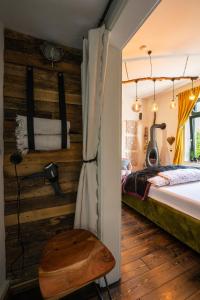 En eller flere senge i et værelse på Boutique Apartment Benz 3 + 9 billeder