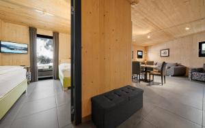 Łóżko lub łóżka w pokoju w obiekcie Aparthotel Zell am See (Contactless Check-In)