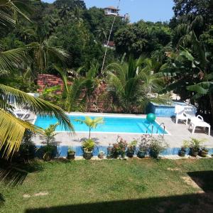 Bazén v ubytování Villa Jungle Paradise nebo v jeho okolí