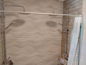 a shower in a bathroom with a shower curtain at Playa-Pinares-Felicidad in Isla Cristina