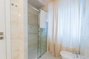 Koupelna v ubytování Palmanova Suites