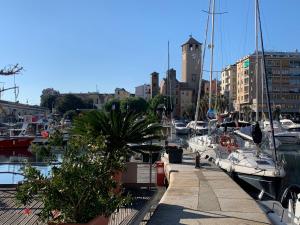 a group of boats docked in a marina at Via Pia 29-7 in Savona