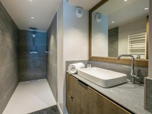a bathroom with a sink and a shower at Appartement Val-d'Isère, 3 pièces, 4 personnes - FR-1-694-326 in Val-d'Isère