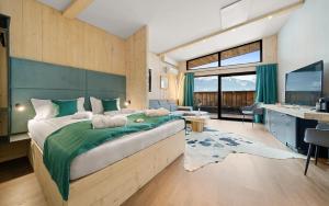 Łóżko lub łóżka w pokoju w obiekcie Aparthotel Zell am See (Contactless Check-In)