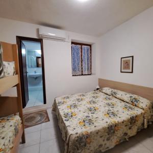 Postel nebo postele na pokoji v ubytování Casa Costa e Manfredi