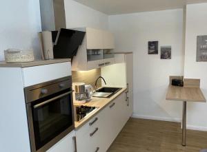 Kuchyň nebo kuchyňský kout v ubytování Gulfhof Greetsiel