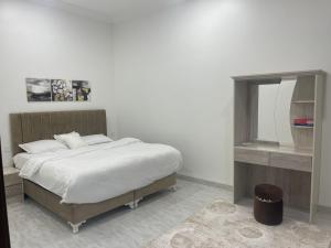 Postel nebo postele na pokoji v ubytování AL Rabie Resort ,Nizwa Grand Mall