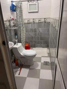 A bathroom at Two bedroom with garden