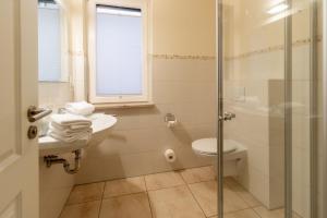 Ένα μπάνιο στο Hafendomicil Appartement WH04 - Igel