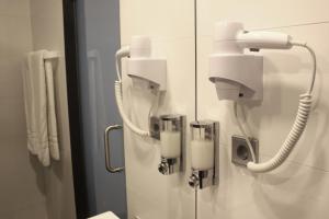 Koupelna v ubytování Hotel M