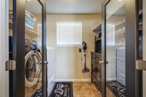 a laundry room with a washer and dryer at Serene Cabin Retreat Between Murphys & Arnold in Murphys