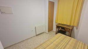 Postel nebo postele na pokoji v ubytování ALBERGUE LA TIÑOSA