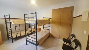 Postel nebo postele na pokoji v ubytování ALBERGUE LA TIÑOSA
