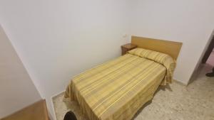 Postel nebo postele na pokoji v ubytování ALBERGUE LA TIÑOSA