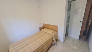 Postel nebo postele na pokoji v ubytování ALBERGUE LA TIÑOSA