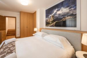 Postel nebo postele na pokoji v ubytování Chalet Falorie