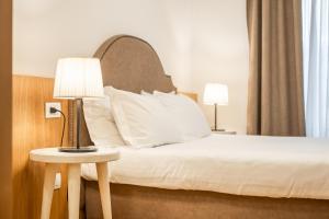 Postel nebo postele na pokoji v ubytování Chalet Falorie