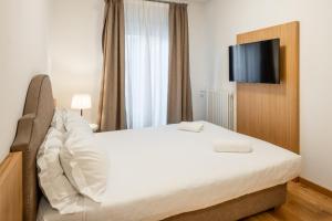 Postel nebo postele na pokoji v ubytování Chalet Falorie