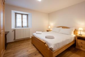 Postel nebo postele na pokoji v ubytování Chalet Falorie