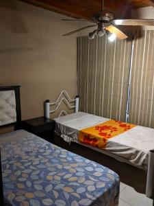 Ein Bett oder Betten in einem Zimmer der Unterkunft Inmuebles Elías