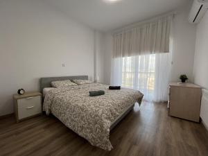 Postel nebo postele na pokoji v ubytování Sunny Rooms