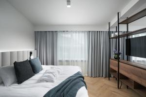 Voodi või voodid majutusasutuse Hotel Klaustur toas