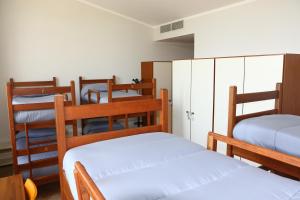 Postel nebo postele na pokoji v ubytování Student's Hostel Parma