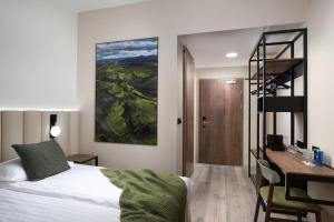 Voodi või voodid majutusasutuse Hotel Klaustur toas