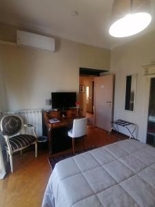 Televízia a/alebo spoločenská miestnosť v ubytovaní B&B Buon Cammino Tuscia Viterbo - colazione inclusa - convenzionato con impianti termali